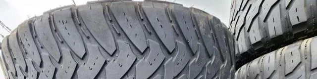 Lee Tire all-terrain used tire stack